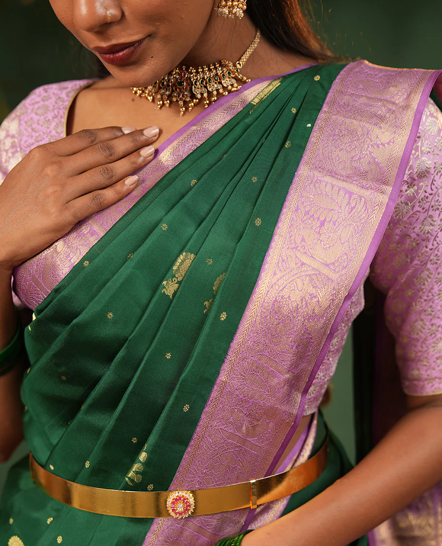 Green yaanai and mayil buttas Vasundhara silk saree, contrast border of muthu, kathir, mayil, and yaanai designs, and diagonal striped pallu - Image 2