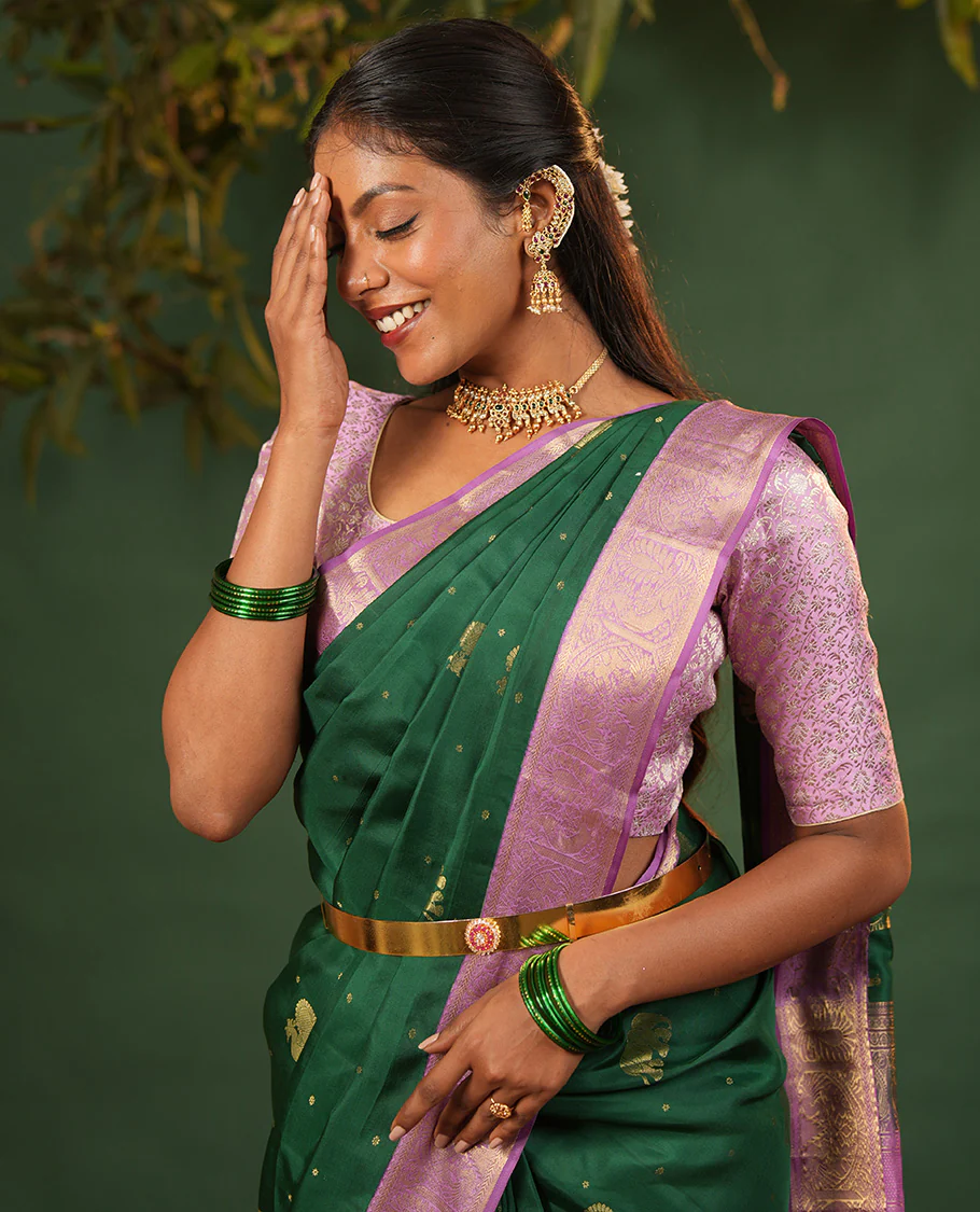 Green yaanai and mayil buttas Vasundhara silk saree, contrast border of muthu, kathir, mayil, and yaanai designs, and diagonal striped pallu - Image 3