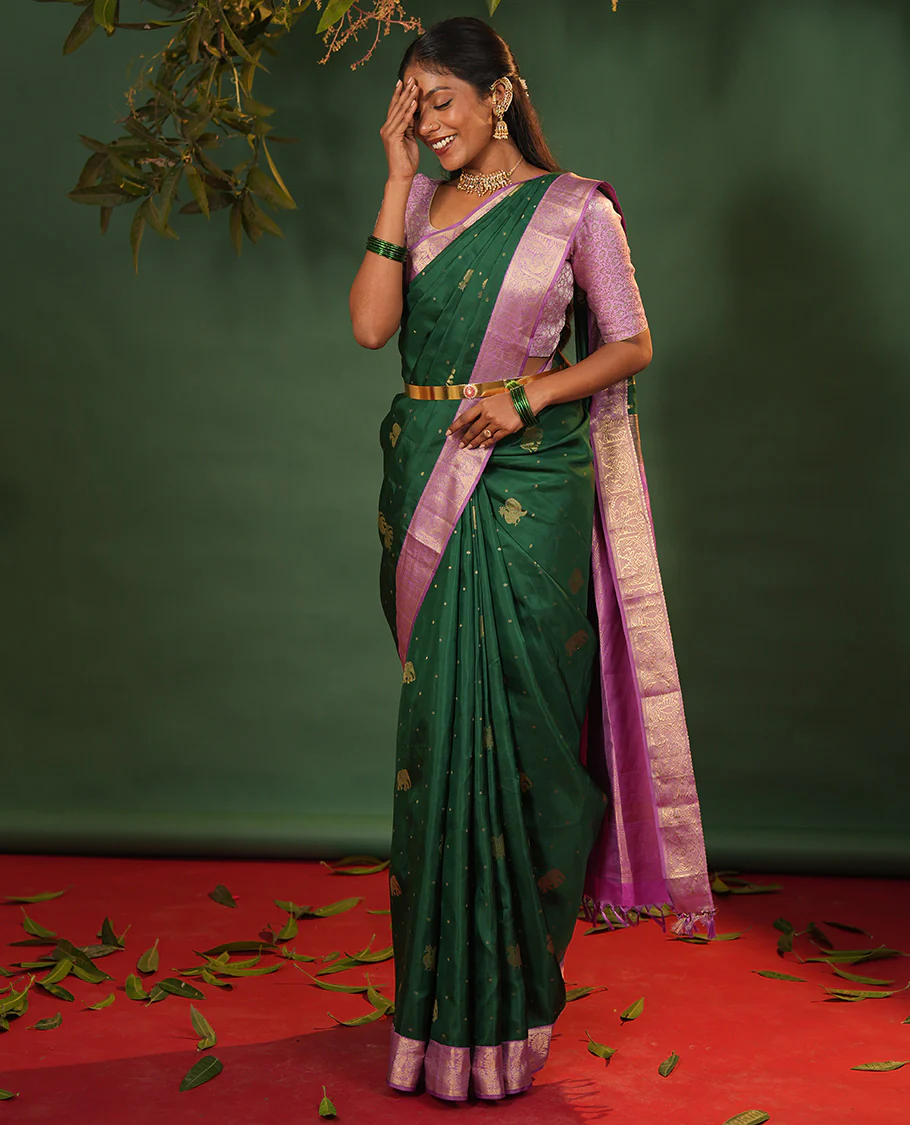 Green yaanai and mayil buttas Vasundhara silk saree, contrast border of muthu, kathir, mayil, and yaanai designs, and diagonal striped pallu - Image 4