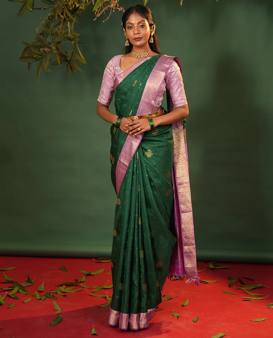 Green yaanai and mayil buttas Vasundhara silk saree, contrast border of muthu, kathir, mayil, and yaanai designs, and diagonal striped pallu - Image 5