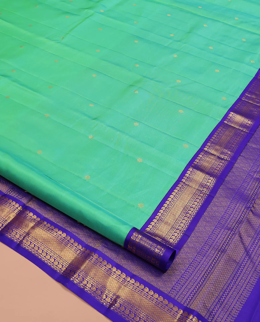 Greenish Turquoise Vasundhara Silk Saree, Showcasing Zari Buttas All Over Its Body, Complemented by a Contrast Border of Manga, Diamond, and Mayil Kann Designs, Grand Jaal Pallu, and Paired with a Contrast Blouse - Image 2