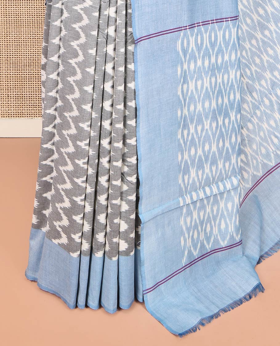 Grey Ikkat Cotton Saree, Bedecked with Ikkat-Style Chevron Stripes on Its Body, Complemented by Contrast Border, Pallu of Ikkat Ogee Patterns, and Has No Blouse - Image 3