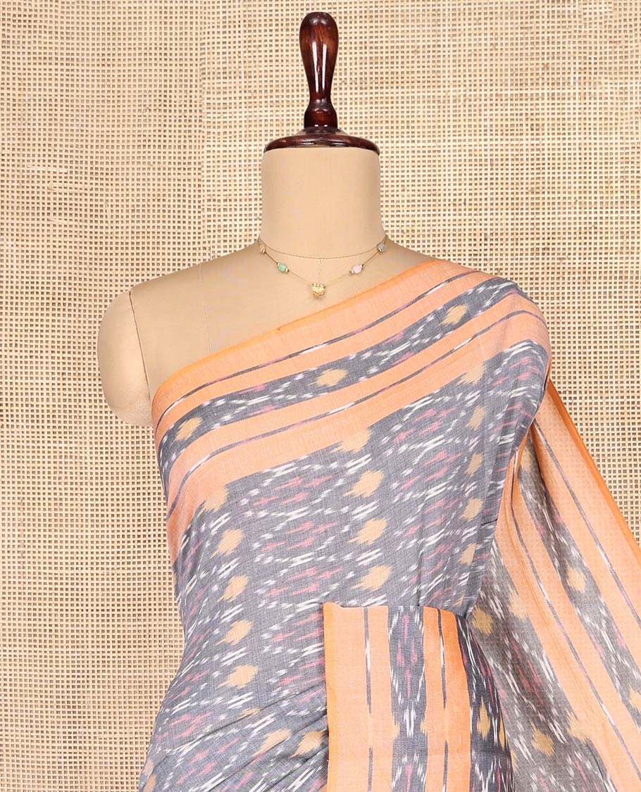 Grey Ikkat Cotton Saree, Decorated with Ikkat-Style Ogee Patterns on Its Body, Complemented by Contrast Ikkat-Textured Border, Pallu Steeped with Ikkat Buttas, and Has No Blouse - Image 2