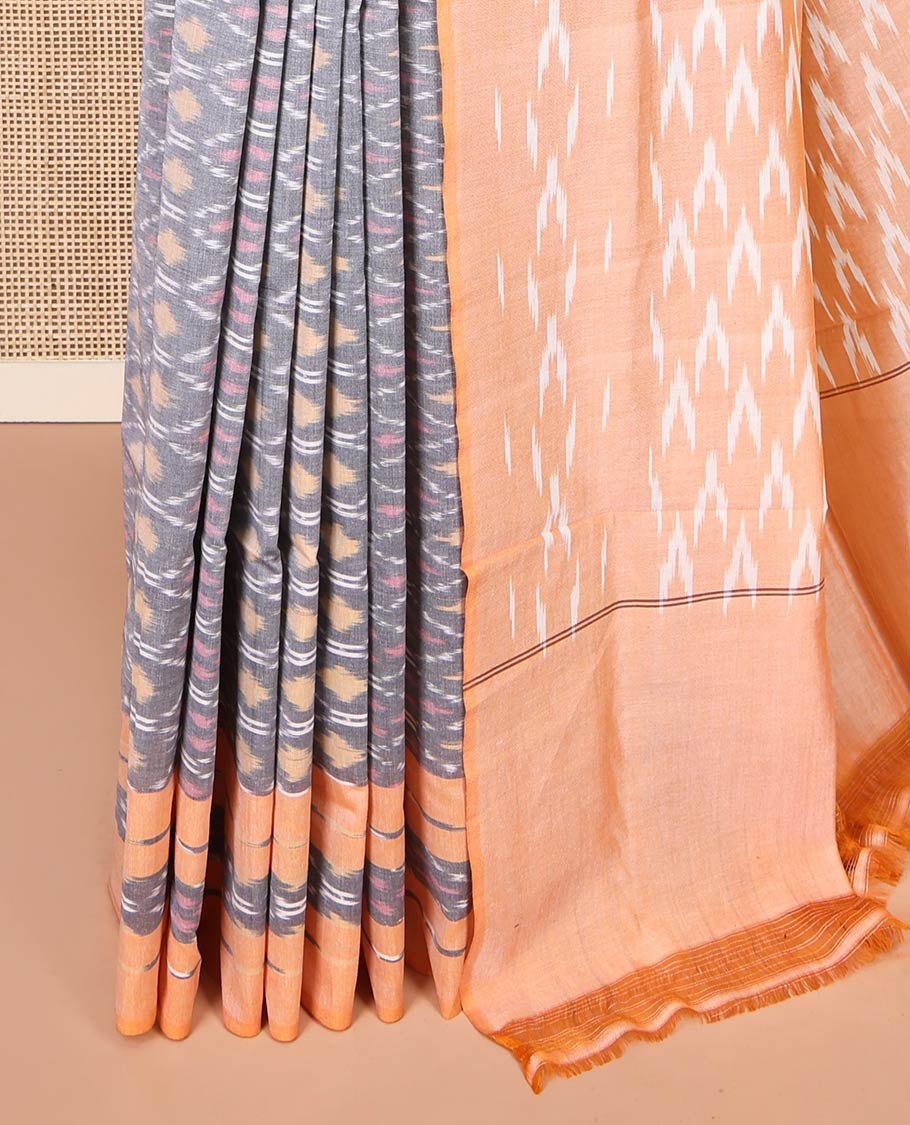 Grey Ikkat Cotton Saree, Decorated with Ikkat-Style Ogee Patterns on Its Body, Complemented by Contrast Ikkat-Textured Border, Pallu Steeped with Ikkat Buttas, and Has No Blouse - Image 3