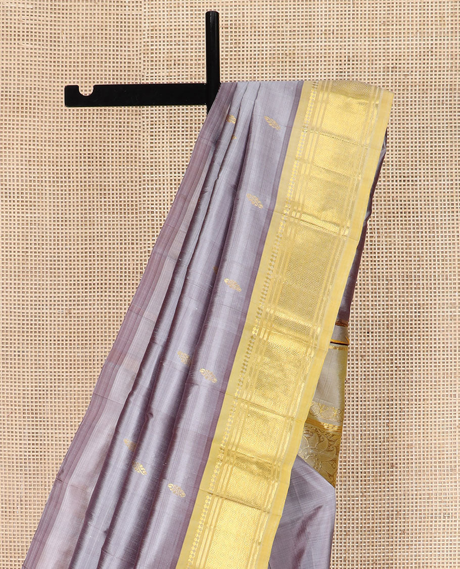 Grey Kanchipuram Silk Saree Detailed with Zari Buttas, Highlighted by Contrast One-Sided Border of Paneer Sombu, Banaras, and Jaal Designs, Pallu Accentuated with Floral Zari Design, and Comes Without a Blouse - Image 3