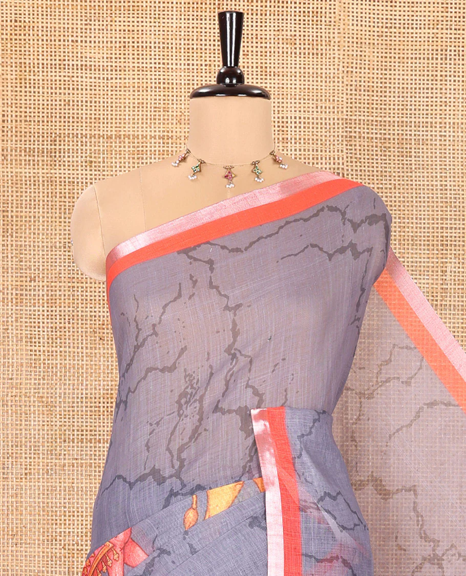 Grey Linen Cotton Saree, Bedecked with Batik Vines and Camel Motifs Printed on Its Body, Complemented by a Contrast Piping Border, Pallu of God and Goddess Figurines, and Paired with a Contrast Blouse - Image 2