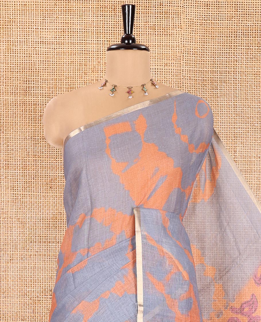 Grey Linen Cotton Saree, Detailed with Shibori Printed on Its Body, Subtle Piping Border, Pallu Features Floral Print, and Paired with a Contrast Floral Printed Blouse - Image 2