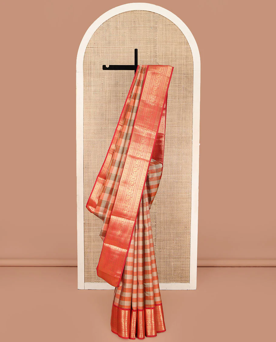 Grey-Orange Striped Vasundhara Lite Silk Mix Saree, Gleamed Up with a Zari Checks on Its Body, Complemented by a Contrast Border of Rekku, Diamond, Mayil, and Kodi Mayil Designs, Gleaming Zari Pallu, and Paired with a Contrast Blouse
