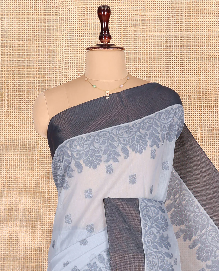 Grey Semi-Silk Cotton Saree, Detailed with Buttas All Over Its Body, Complemented by a Contrast Border, Pallu Steeped with Floral Designs, and Paired with a Matching Blouse - Image 2