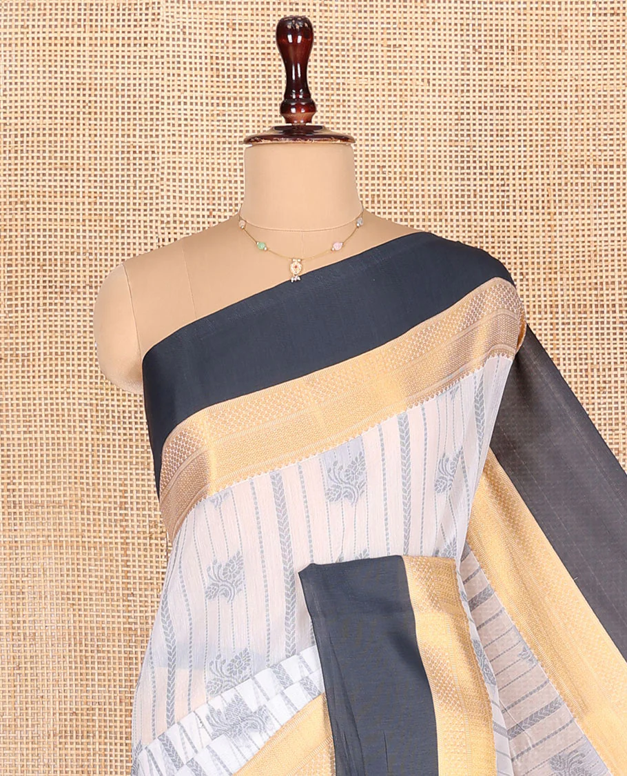 Grey Semi-Silk Cotton Saree, Embellished with Buttas and Stripes All Over Its Body, Complemented by a Contrast Traditional Zari Design Border, Pallu of Jaal Designs, and Paired with a Matching Blouse - Image 2