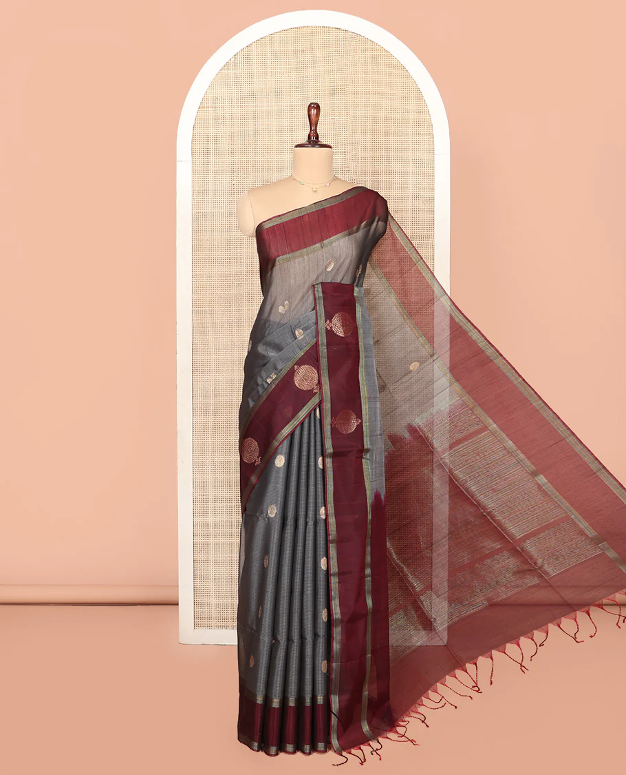 Grey Silk Cotton Saree, Artfully Woven with Peacock and Rudraksham Motifs On Its Body, Complemented by Contrast Zari Motifs Woven Border, Geometric Zari Patterned Pallu and Paired with a Contrast Blouse