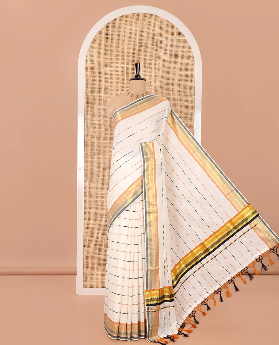 Half-White Kerala Cotton Saree, Subtly Sparkled with Dotted Stripes on Its Body, Complemented by a Contrast Border, Pallu of Subtle Stripes, and Paired with a Matching Blouse