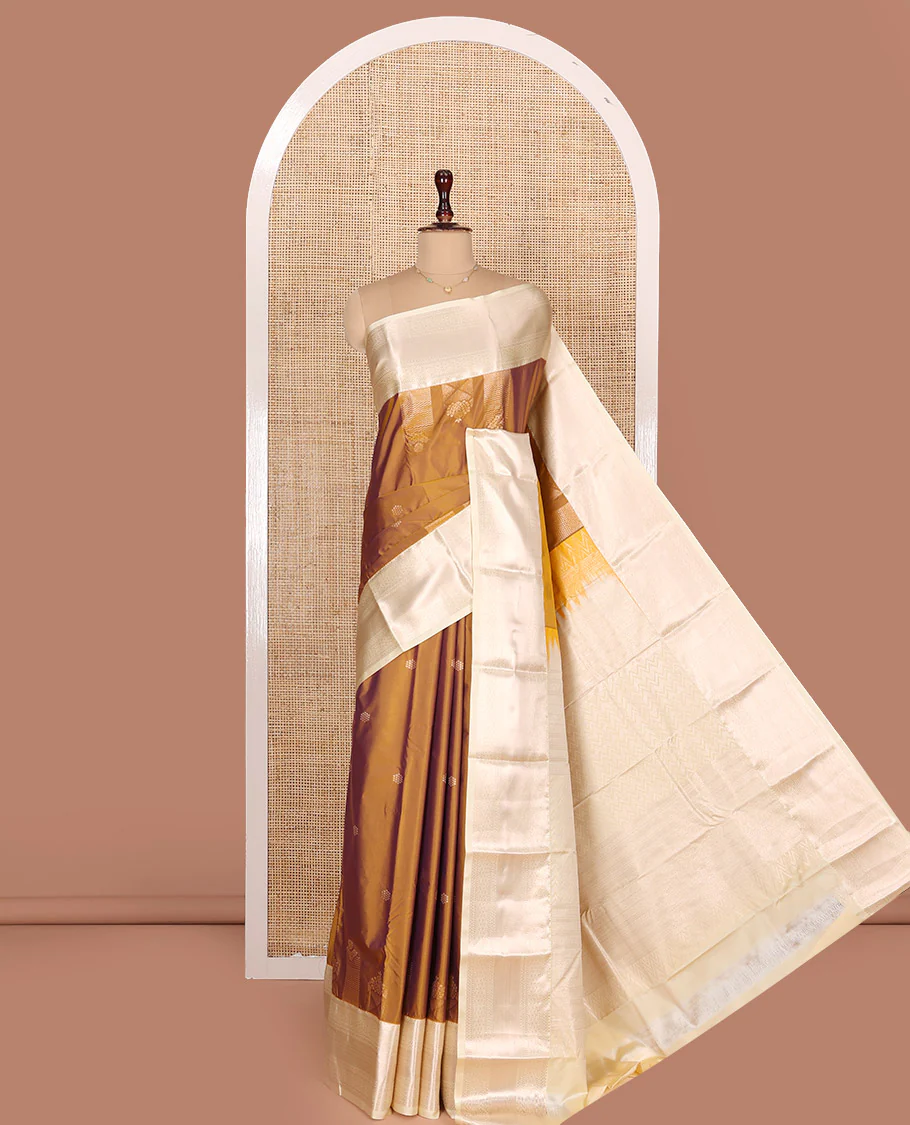 Honey Color Budget Silk Saree, Enriched with Zari Designs  All Over Its Body, Complemented by a Contrast Border of Traditional Designs Woven in Zari, Pallu Detailed with Chevron Designs, and Paired with a Contrast Blouse