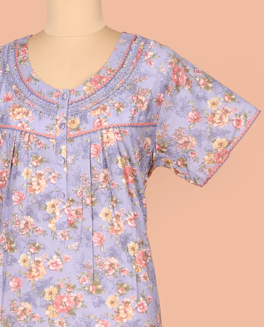 Lavender Cotton Nighty Decked Up with Floral Print, Featuring Lace Work, Round Front Neck, and Half Sleeves