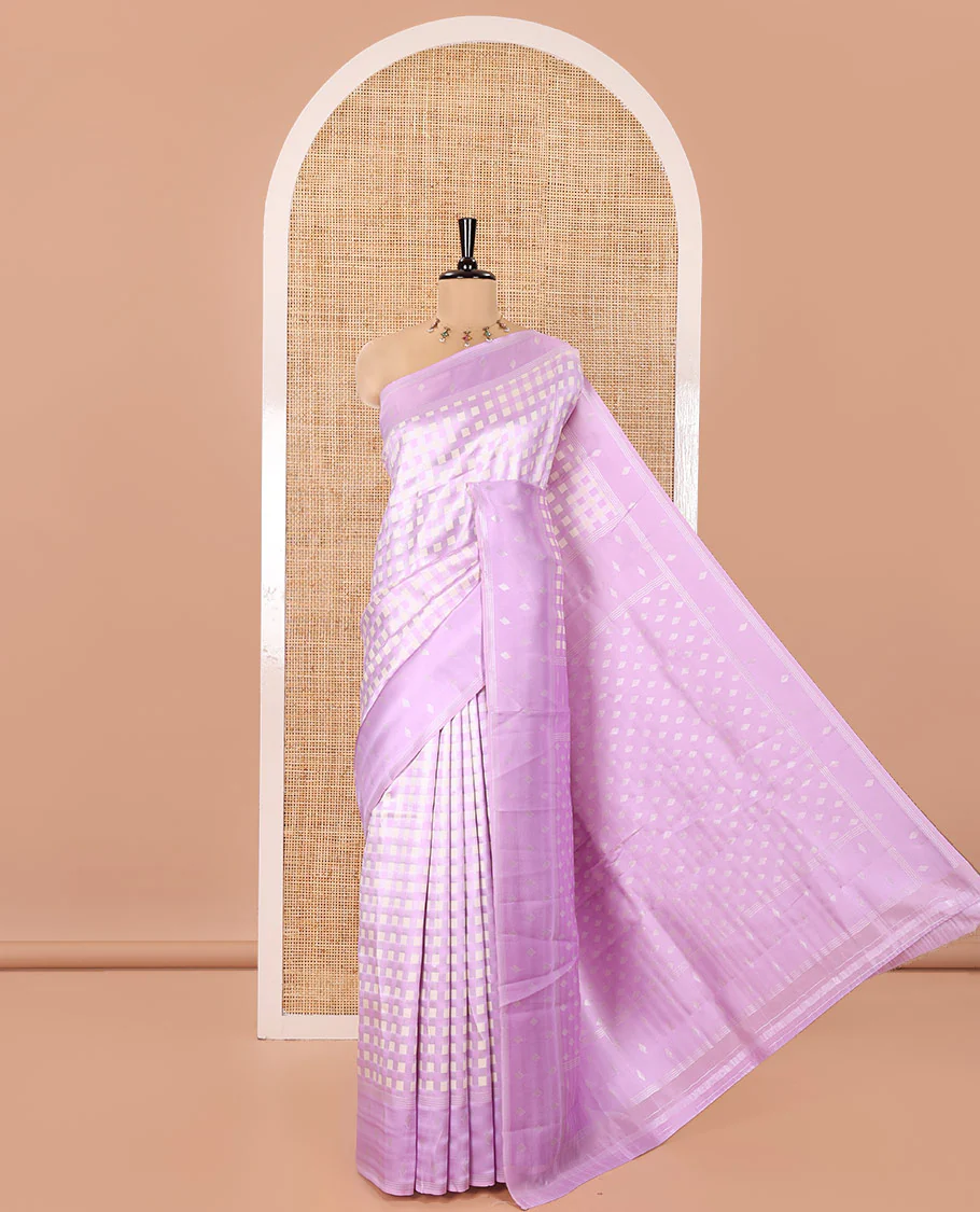 Lavender Kanchi Silk Saree, Enlivened with Checked Design on Its Body, Highlighted by a Self-Border of Diamond Patterns, Pallu Steeped with Buttas, and Paired with a Matching Blouse