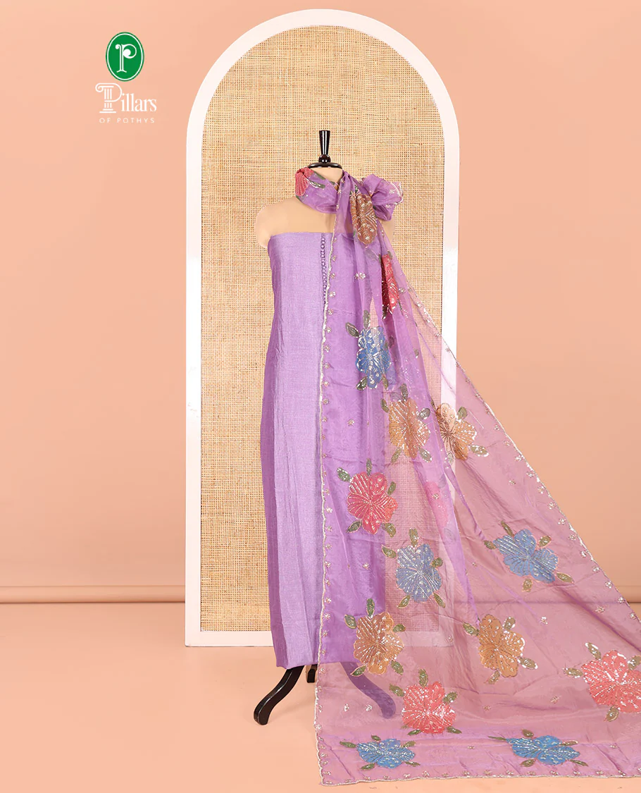 Lavender Vichitra Silk Material Chudidar Set, Accentuated with Pom-Pom Necklined Top, a Plain Santoon Bottom, and Paired Scallop Multi-Color Floral Embroidered Organza Dupatta