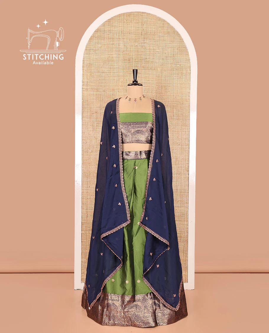 Leaf Green and Blue Semi-Banarasi Half-Saree, Beautifully Woven with Zari Buttas on Its Skirt, Complemented by a Contrast Geometric Patterns Zari Woven Border, Paired with a Matching Blouse, and a Contrast Satin Georgette Embroidered Scallop Dhavani - Image 2