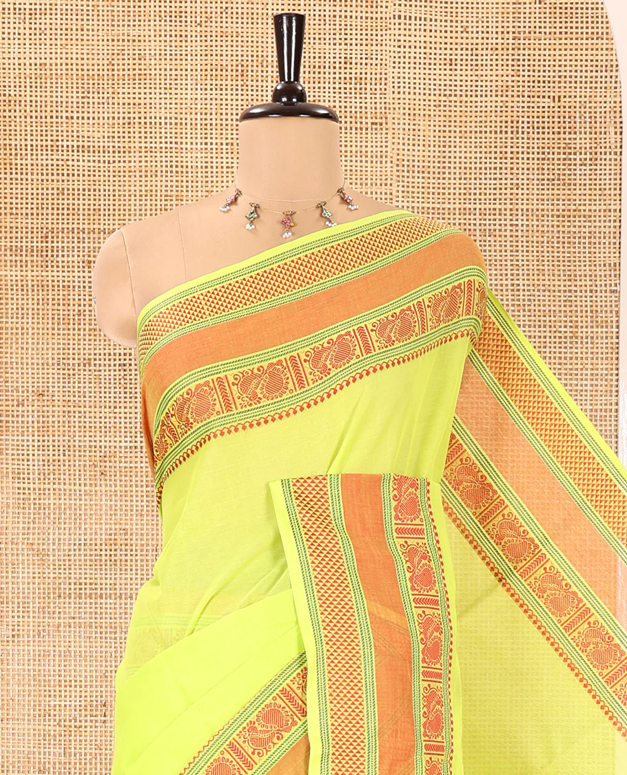 Leaf Green Plain Chettinad Cotton Saree, Delicately Decked Up with Traditional Thread Border Featuring Peacock and Ara Maadam Designs, Subtly Striped Pallu, and Paired with a Matching Blouse - Image 7
