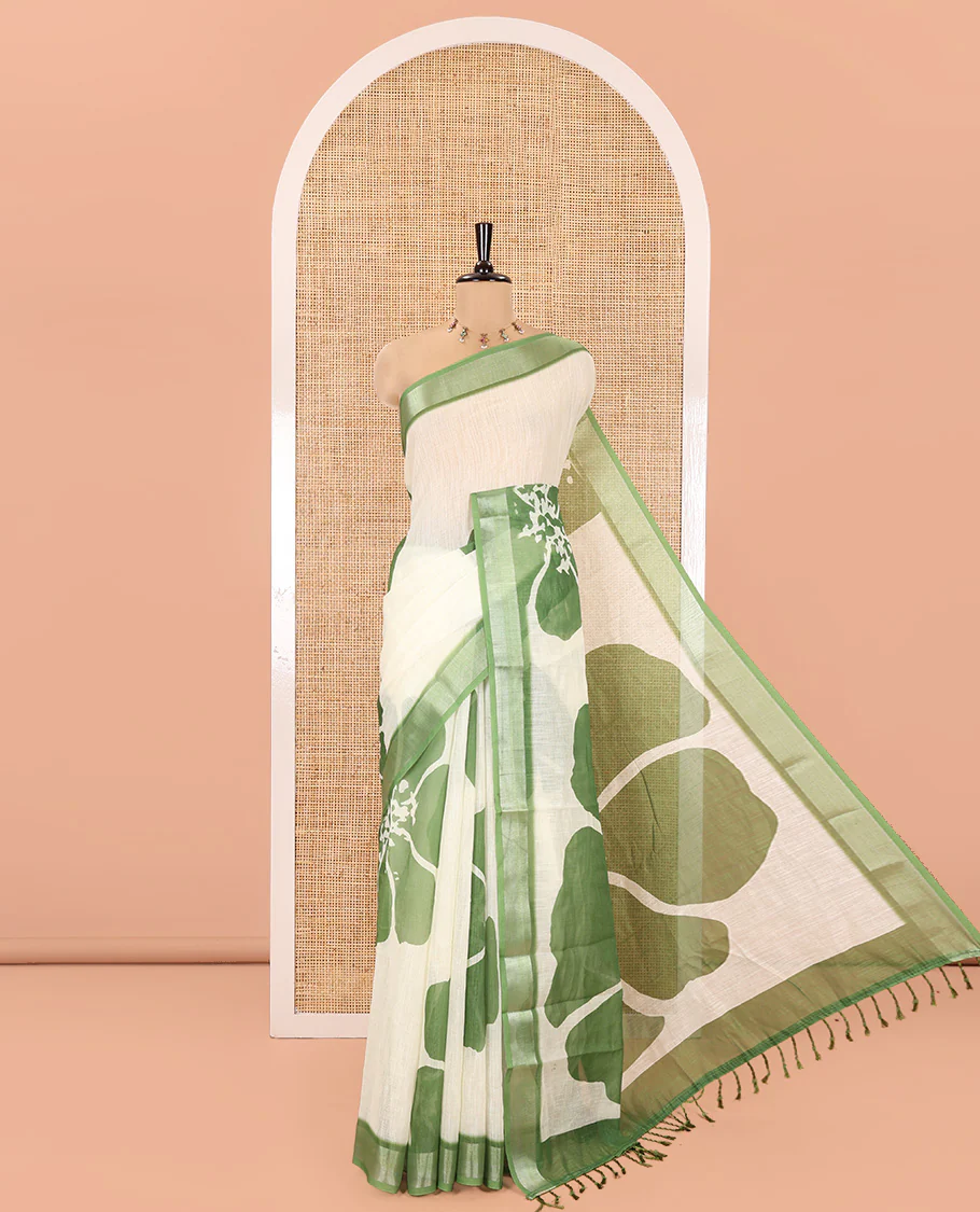 Lemon Yellow Linen Cotton Saree, Prettified with Big Floral Prints On Its Body, Complemented by Contrast Zari Bavanji Border, Floral Printed Pallu, and Paired with a Hand Block Printed Blouse