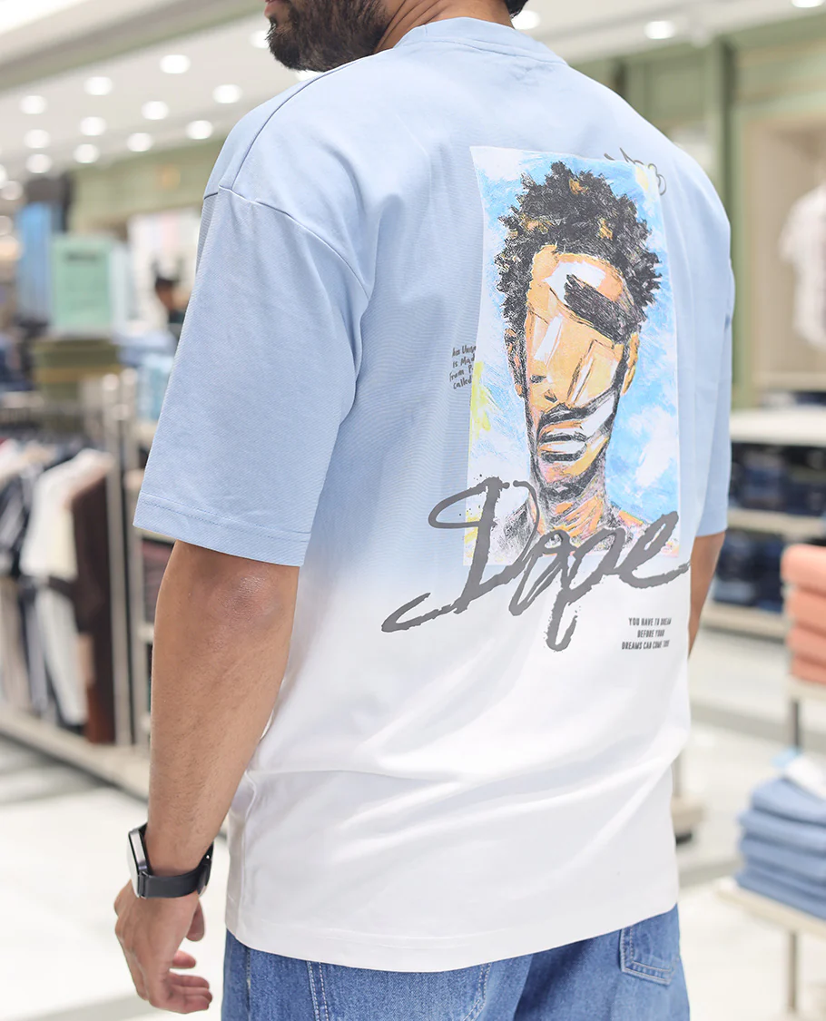 Light Blue Cotton-Blended Ombre T-Shirt, Artfully Detailed with Funky Motifs and Typography Prints, Comes with a Crew Neck, Half-Sleeves, Oversized Fit, and Long Length - Image 2