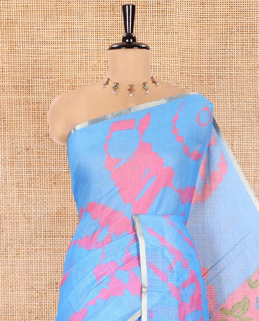 Light Blue Linen Cotton Saree, Graced with Shibori Printed on Its Body, Subtle Piping Border, Pallu Features Floral Print, and Paired with a Contrast Floral Printed Blouse - Image 2