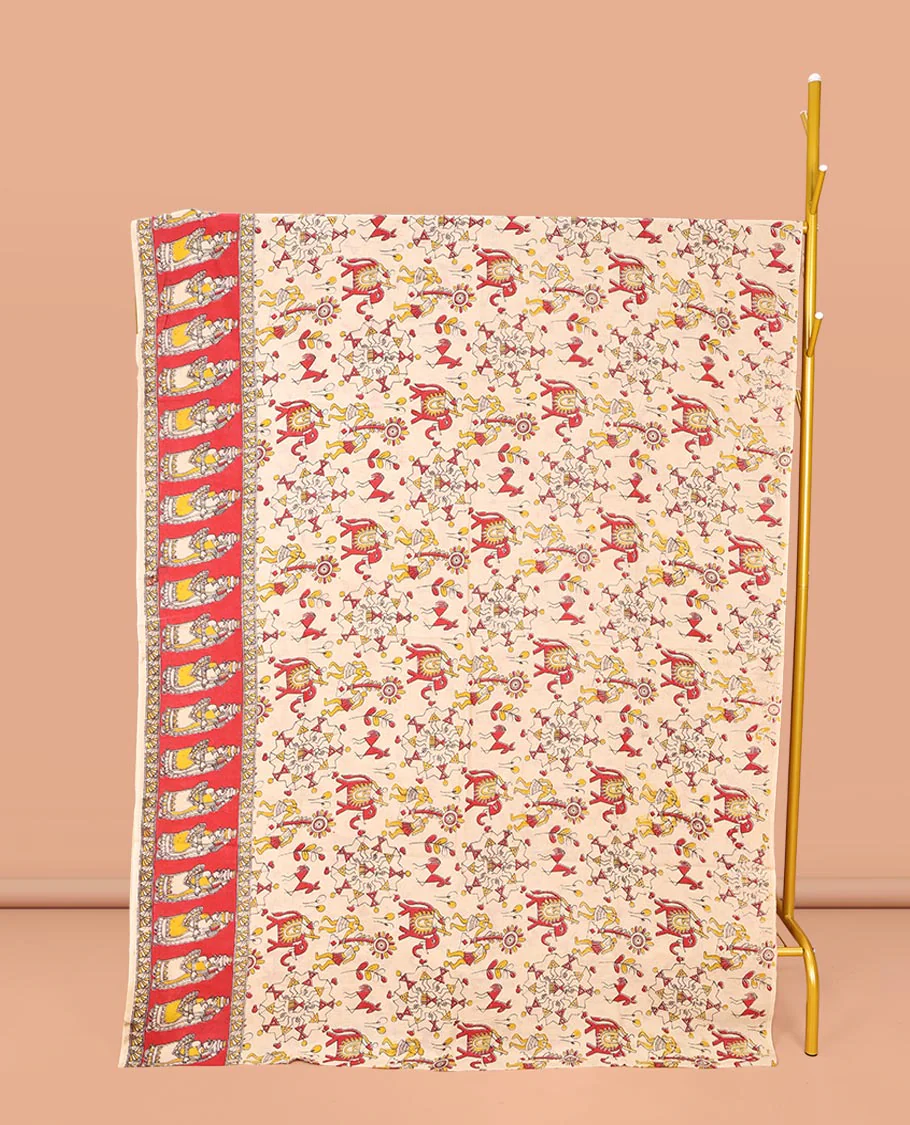 Light Cream Machine-Printed Kalamkari Cotton Saree, Artfully Printed with Warli-Motifs on Its Body, Complemented by a Contrast Human Motifs Printed Border, Pallu of Lord Radha Krishnan Print, and Paired with a Printed Blouse