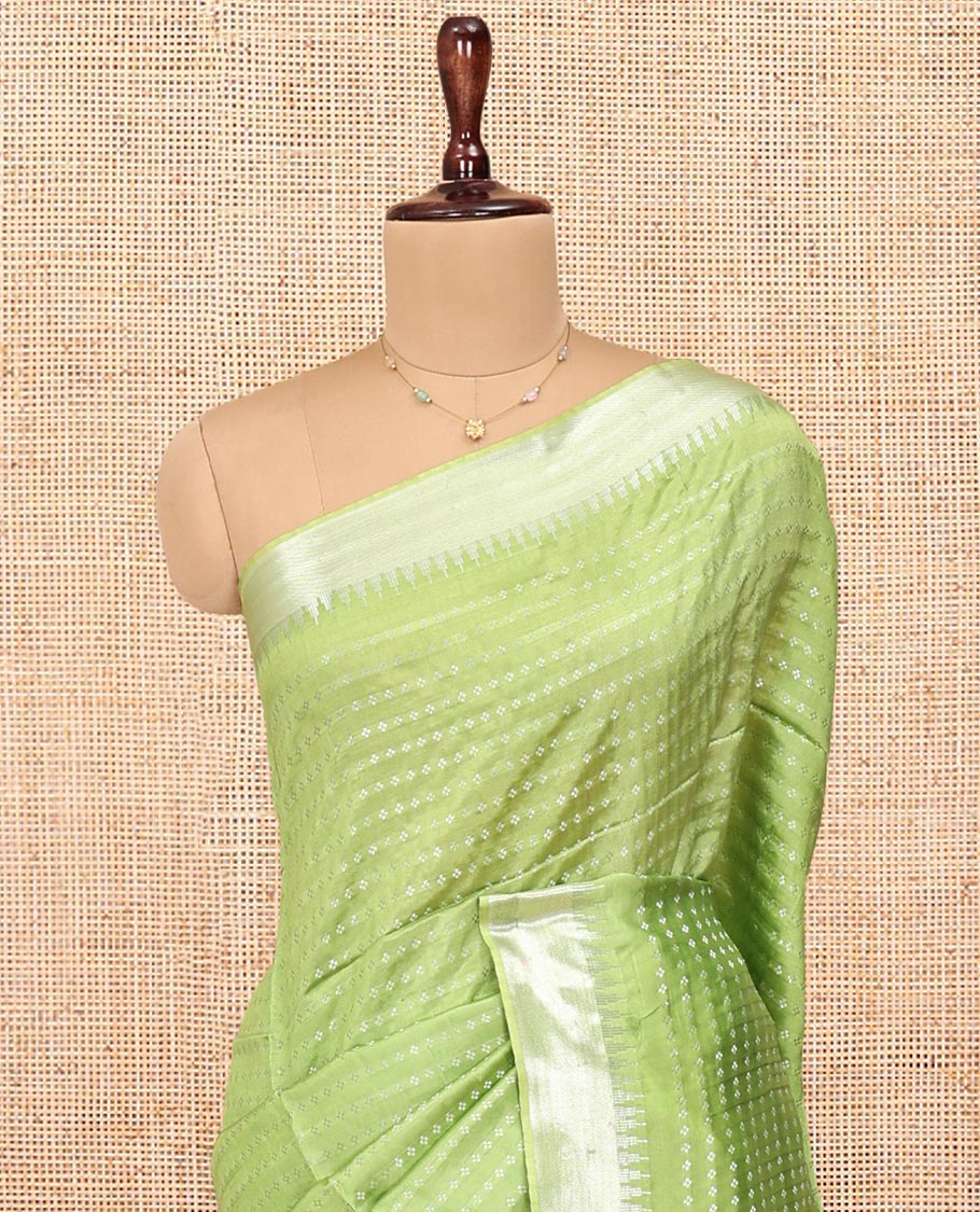 Light Green Banana Pith Saree, Lightly Embellished with Buttas All Over Its Body, Highlighted by a Zari Temple Border, Gleaming Zari Striped Pallu, and Paired with a Matching Blouse - Image 2