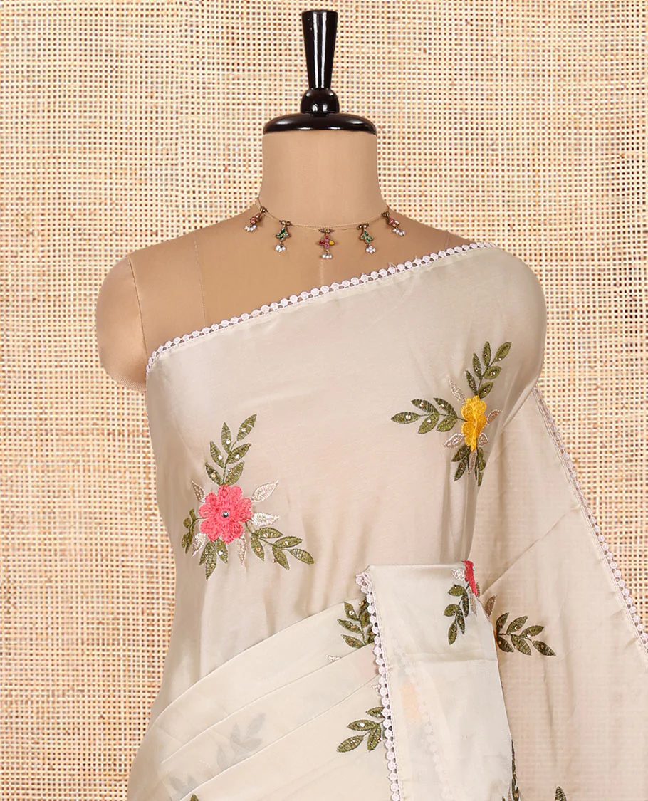 Light Grey Rangoli Chiffon Saree, Artfully Embroidered with Floral Motifs in Thread and Stone Work On Its Body, Subtly Sparkled with Lace Border, a Self-Pallu, and Paired with a Contrast Floral Embroidered Blouse - Image 2