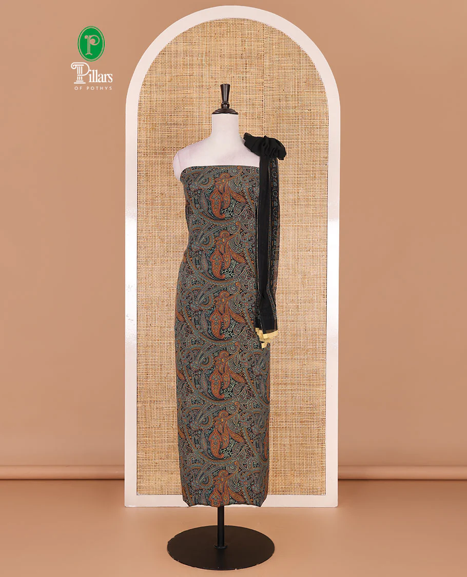 Light rama Italian crepe material chudidar set, paisley printed top, plain bottom, and floral-paisley printed georgrette dupatta