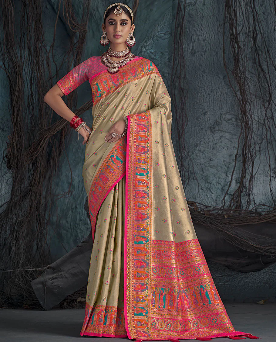 Light Sandal Designer Saree, Subtly Sparkled with Meena Buttas All Over Its Body, Complemented by a Contrast Mughal-Style Human Motifs Border, Pallu of Mughal-Style Designs, and Paired with a Contrast Blouse