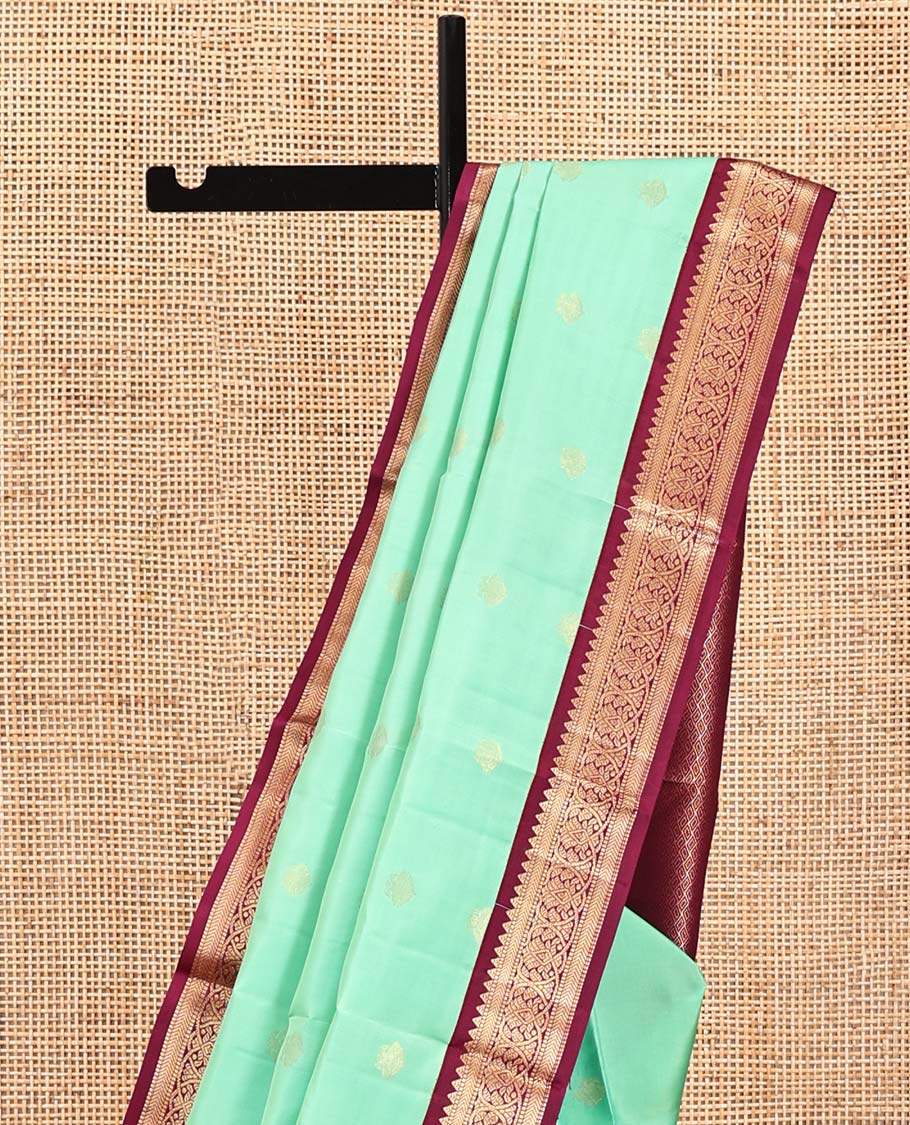 Light Turquoise Vasundhara Silk Saree, Sparsely Woven with Zari Buttas All Over Its Body, Complemented by a Contrast Border of Rekku, Muthu, Kathir, and Kodi Visiry Designs, Grand Jaal Pallu, and Paired with a Contrast Blouse - Image 3