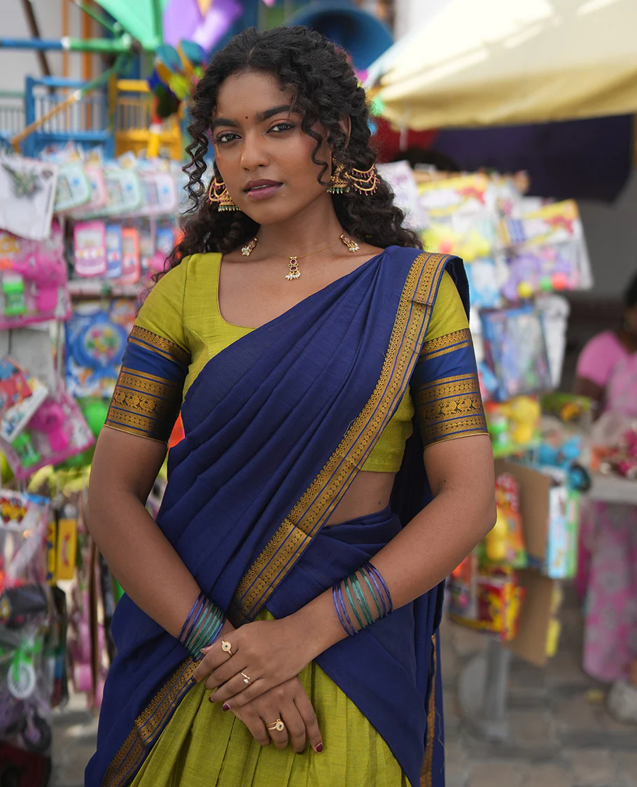 Liril Green-Royal Blue Mercerised Cotton Half-Saree Features Plain Skirt, Contrast Traditional Annam-Motif Border, a Matching Blouse, and Contrast Dhavani - Image 2