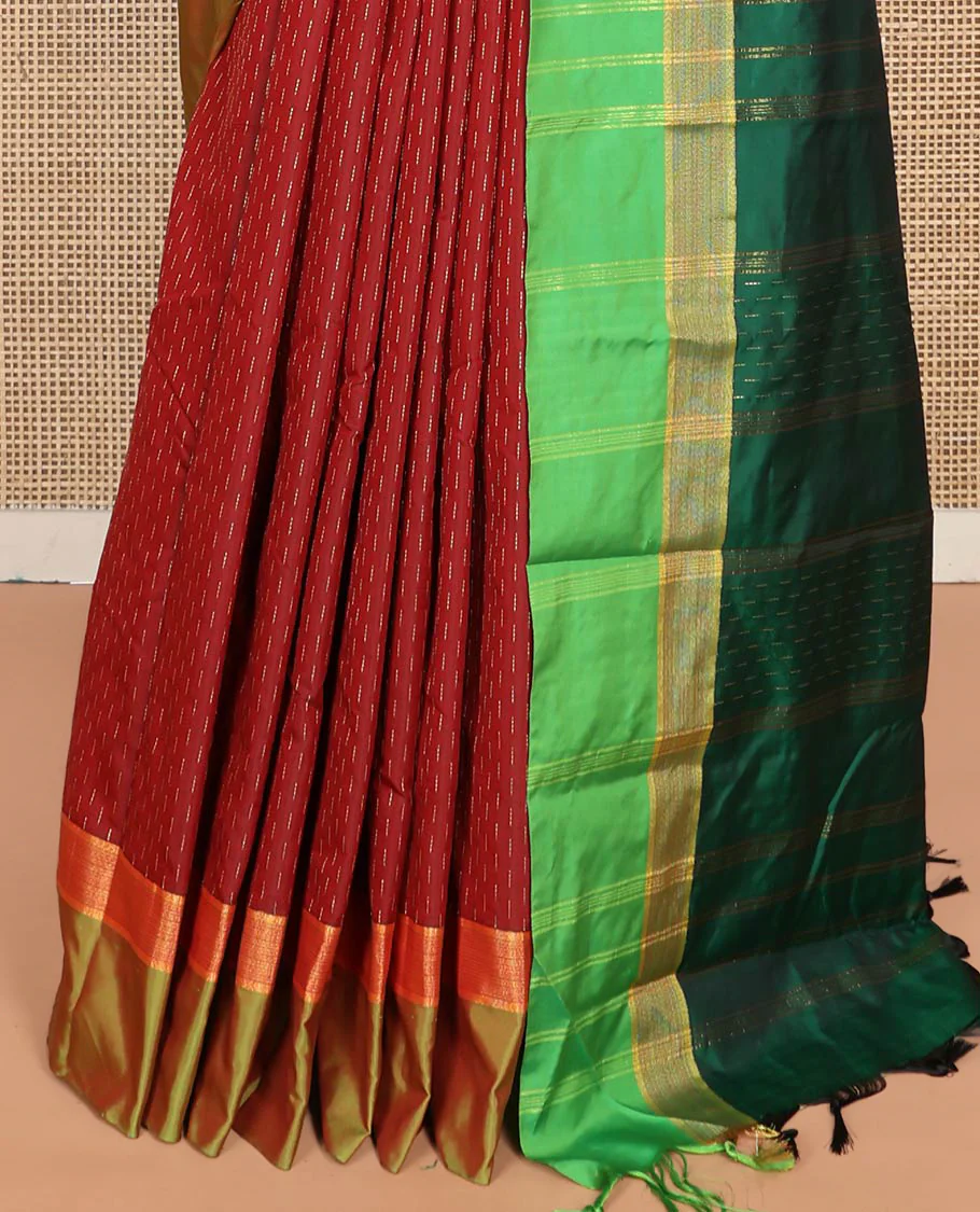 Maroon Aarani Silk Saree, Detailed with Zari Buttas on Its Body, Complemented by a Contrast Zari Border, Pallu of Stripes and Buttas, and Paired with a Contrast Blouse - Image 4