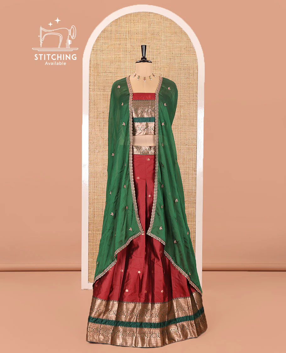 Maroon and Green Semi-Banarasi Half-Saree Featuring Zari Buttas Skirt, Complemented by Contrast Rettai Pettu, Traditional Border of Floral Creeper Designs, Paired with a Matching Blouse, and a Satin Georgette Embroidered Scallop Dhavani - Image 2