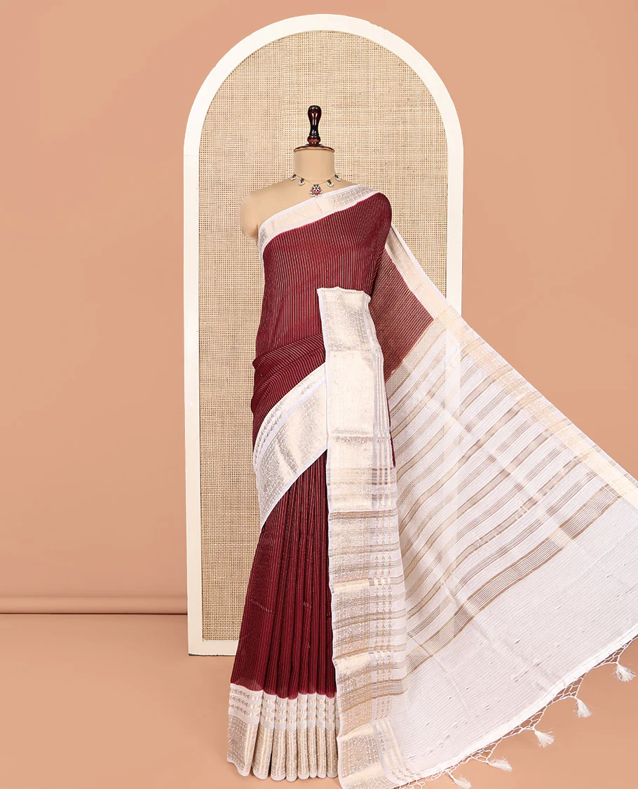 Maroon Assam Silk Saree, Steeped with Zari Stripes, a Contrast Traditional Zari Design Border, a Pallu Steeped with Zari Stripes, and a Contrast Blouse