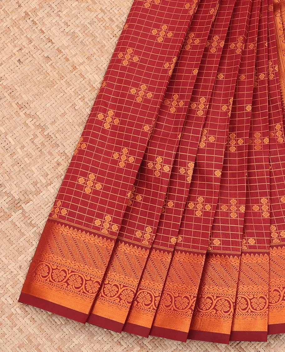Maroon Budget Silk Saree, Ornamented with Zari Buttas and Checks All Over Its Body, Highlighted by a Traditional Zari Design Border, Grand Pallu, and Paired with a Matching Blouse