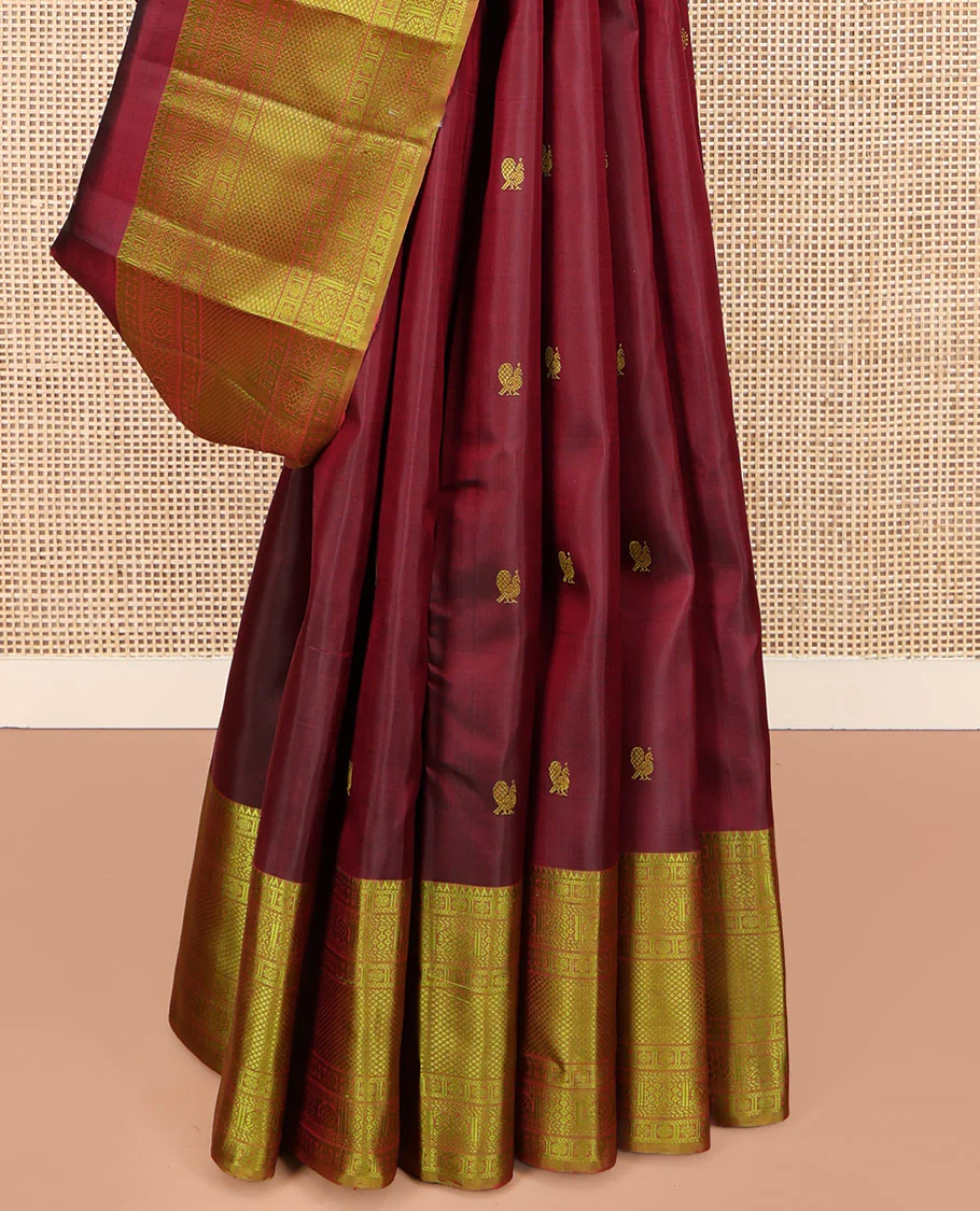 Maroon Kanchipuram Silk Saree, Delicately Woven with Mayil and Chakram Thread Buttas, Complemented by a Contrast Border of Rekku, Kamalam, Poun, Chakram, Kuyil Kann, and Then Kuli Kann Designs, Jaal Design Pallu, and Paired with a Contrast Blouse - Image 4