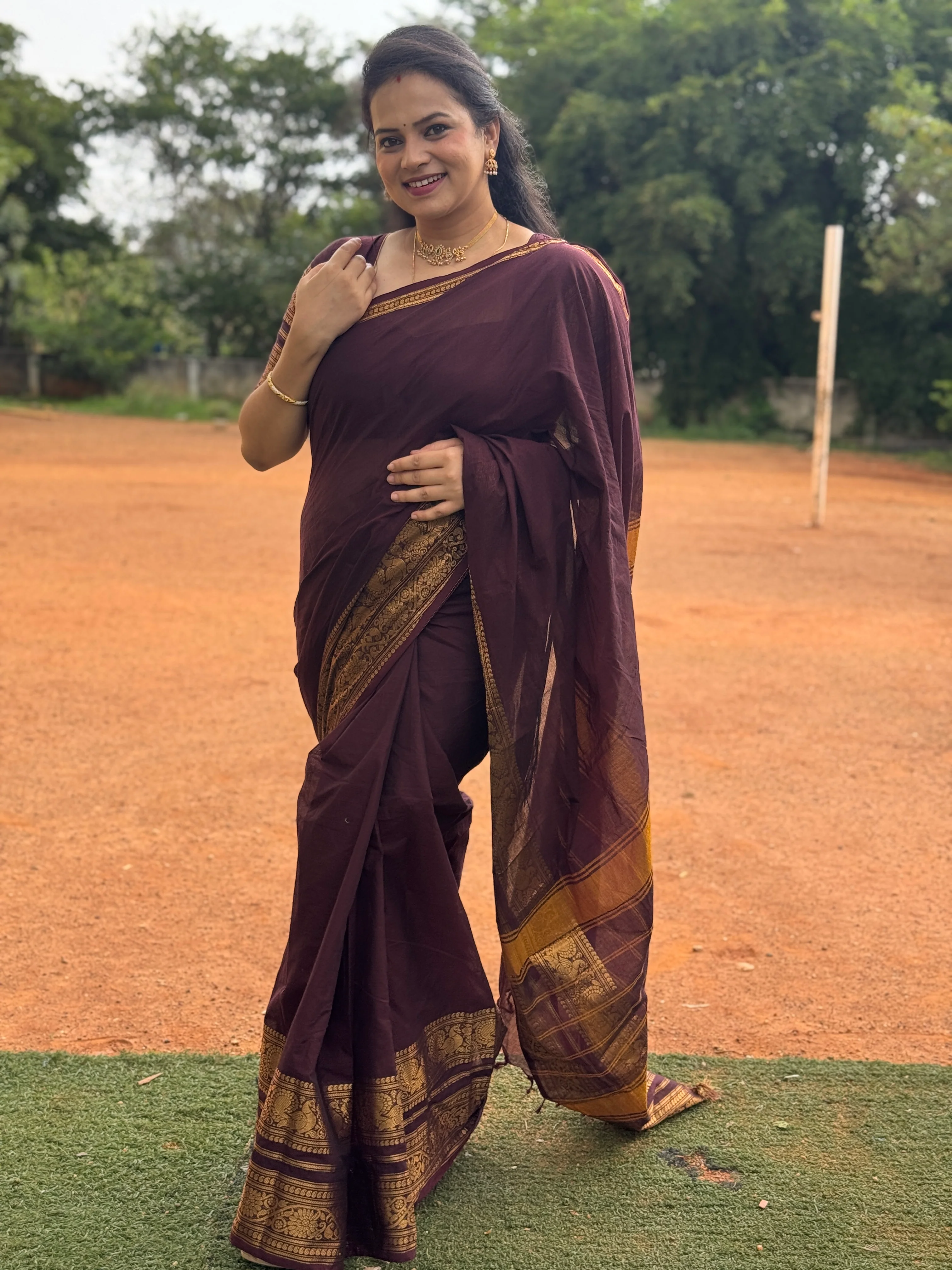 Maroon Plain Chettinad Cotton Saree, Highlighted by Self-Border of Traditional Zari Designs, Subtly Striped Pallu, and Paired with a Matching Blouse