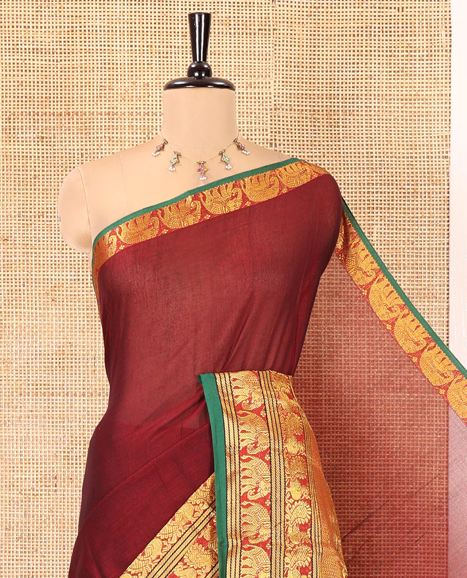 Maroon Plain Mercerised Cotton Saree, Complemented by a Contrast Traditional Border of Peacock, Elephant, and Peacock Eye Designs, Striped Pallu, and Paired with a Matching Blouse - Image 2