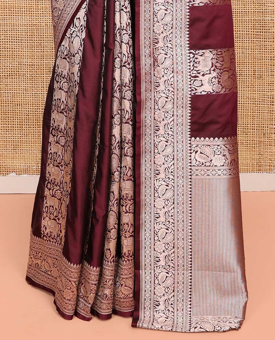 Maroon Semi-Banaras Silk Saree, Impeccably Detailed with Animal-themed Jacquard Designs on Its Body, Highlighted by a Zari Border of Traditional Designs, Pallu Steeped with Stripes, and Paired with a Matching Blouse - Image 4