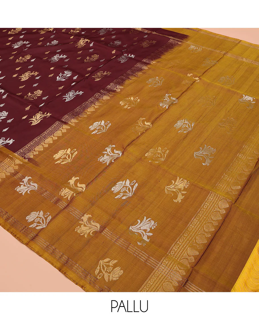 Maroon Uppada Silk Saree, Ornamented with Zari Buttas All Over Its Body, Complemented by Contrast Zari Border of Floral Designs, Pallu Steeped with Floral Designs, and Paired with a Contrast Blouse - Image 5
