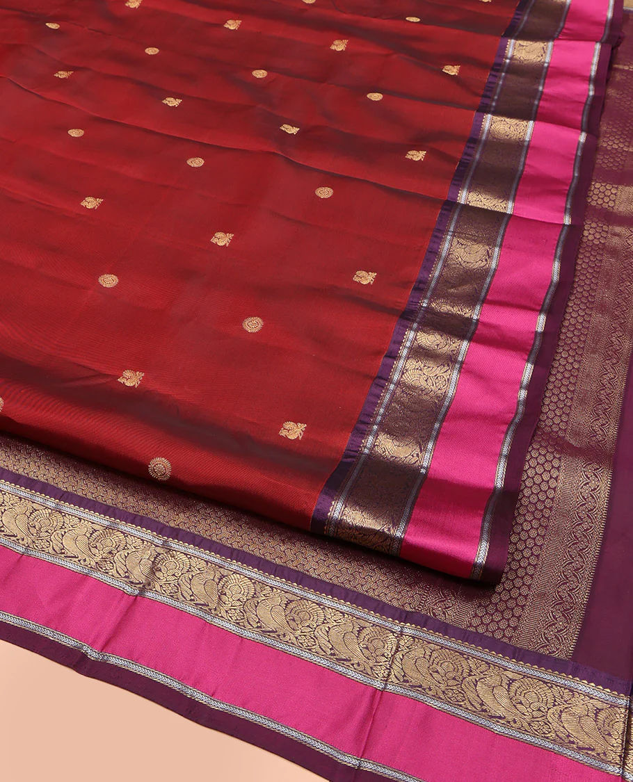 Maroon Vasundhara Lite Silk Mix Saree, Accentuated with Annam Chakram Zari Buttas, Complemented by a Contrast Rettai Pettu Border of Rekku, Kathir, and Mayil Designs, Meticulously Designed Pallu, and Paired with a Contrast Blouse - Image 2