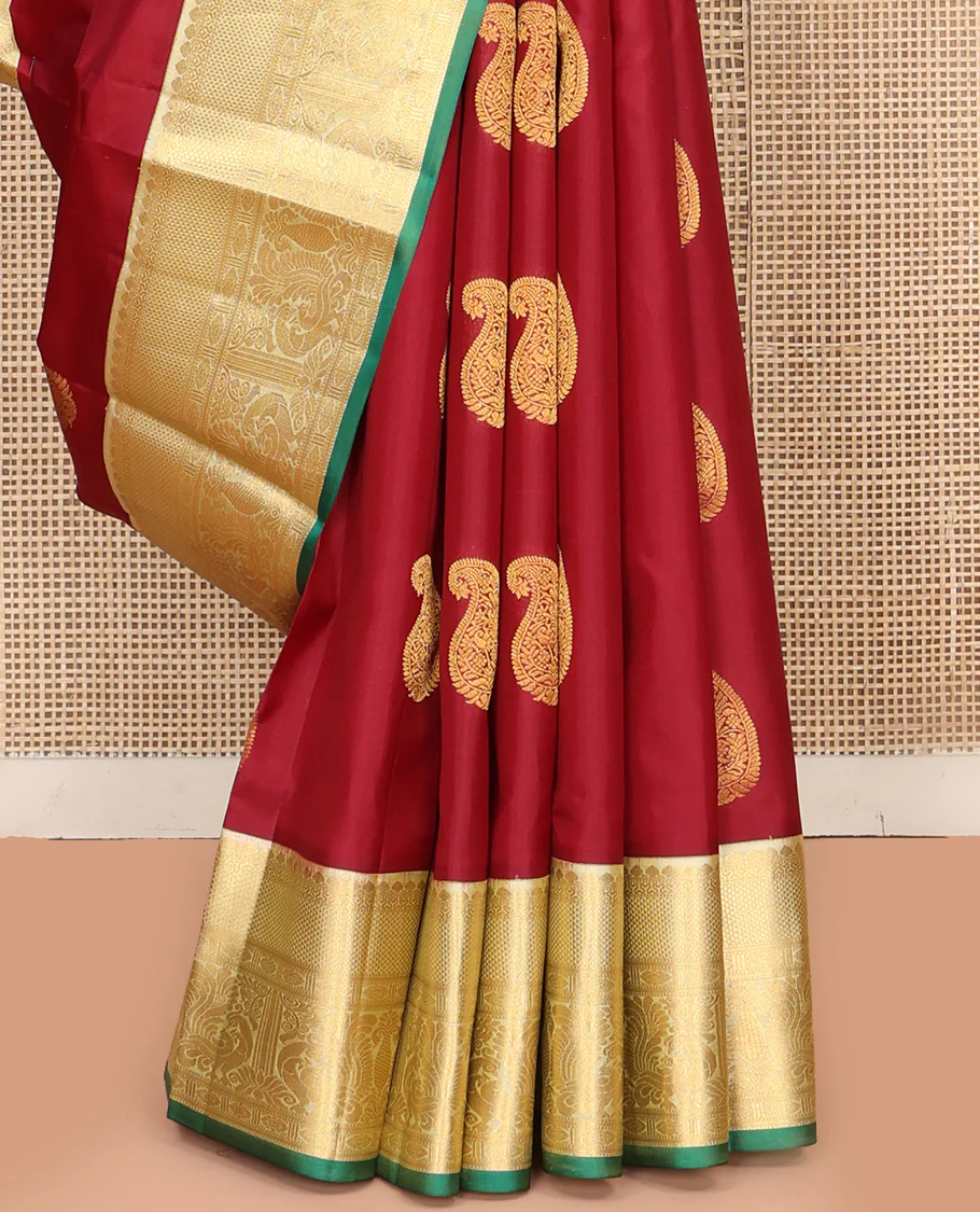 Maroon Vasundhara Silk Saree, Adorned with Arumbu Manga Buttas All Over Its Body, Complemented by Contrast Border of Thilakam Mokku, Mayil and Mayil Kann Designs, Grand Pallu and Paired with a Contrast Blouse - Image 4