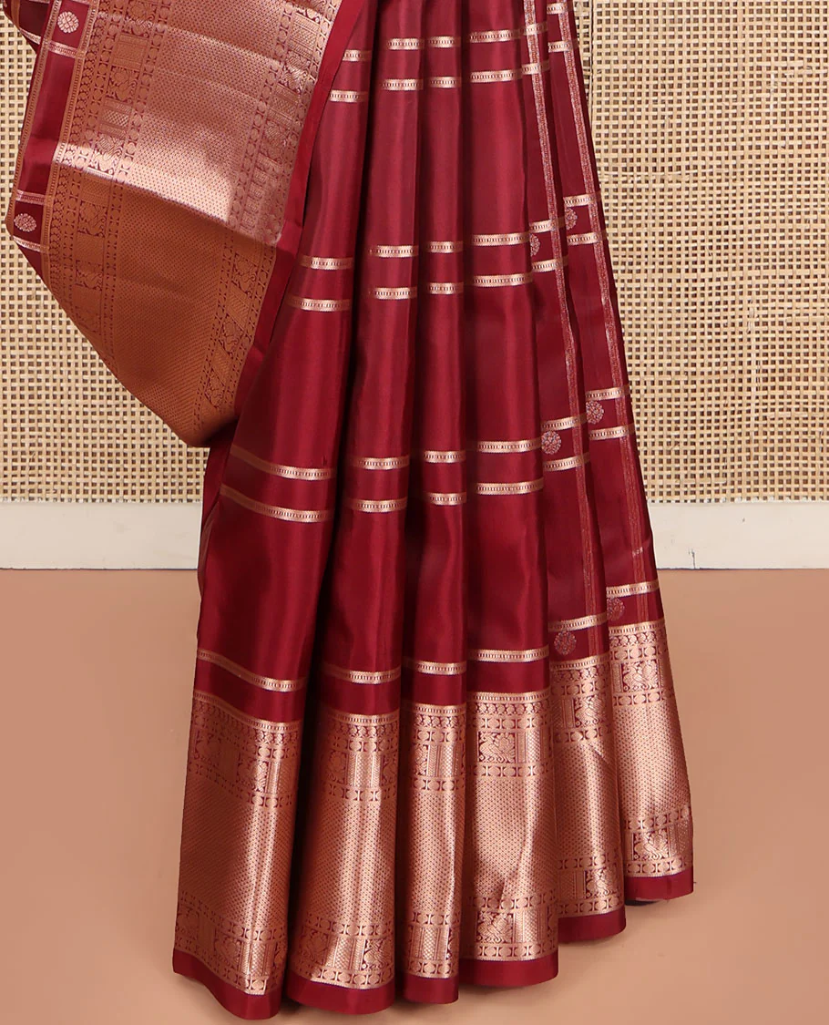 Maroon Vasundhara Silk Saree, Artfully Detailed with Buttas and Checked Design on Its Body, Highlighted by Zari Border of Manga Mokku, Poun, Mayil, and Mayil Kann Designs, Pallu of Geometric Designs, and Paired with a Matching Blouse - Image 4