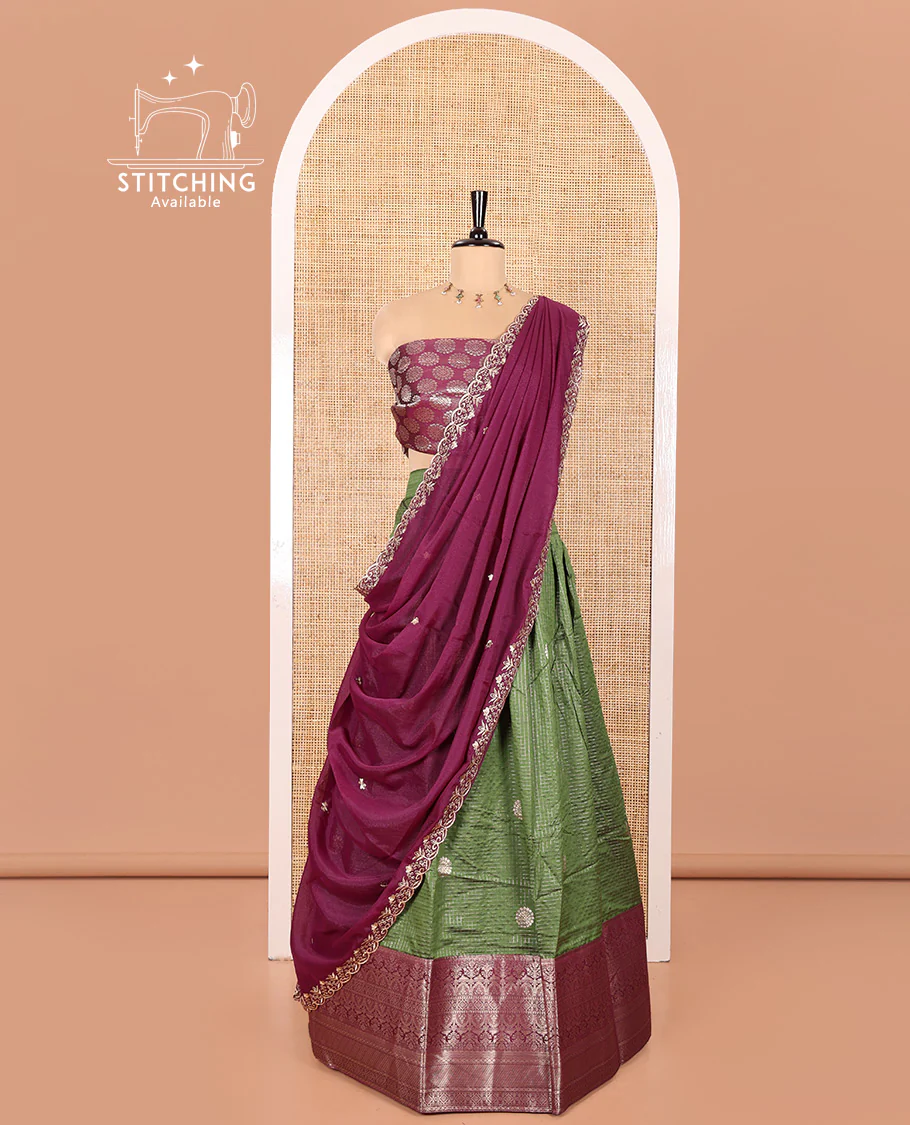 Mehendi Green and Purple Banarasi Silk Half-Saree Featuring Micro-Checks and Chakram Buttas Woven Skirt, Complemented by Contrast Traditional Zari Design Border, Paired with a Jacquard Blouse, and a Rangoli Georgette Embroidered Dhavani