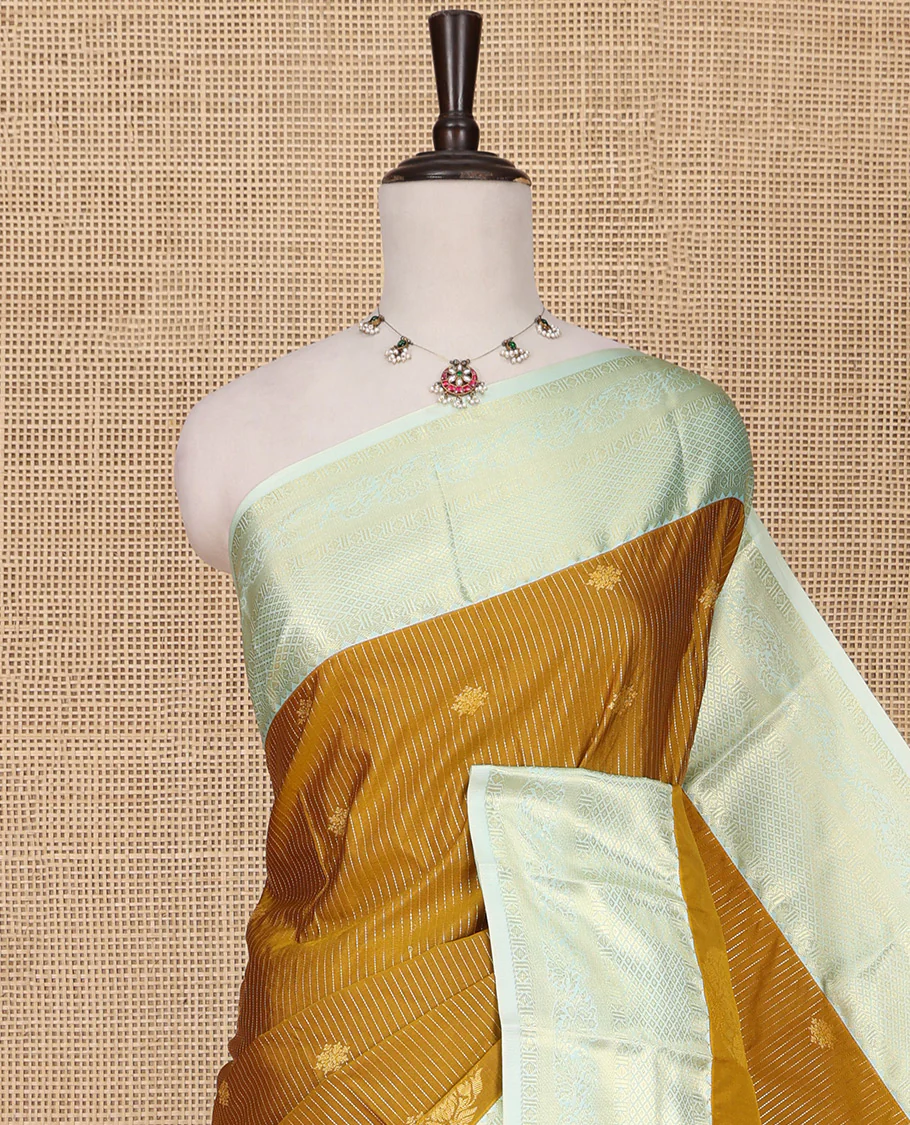 Mustard Budget Silk Saree, Detailed with Zari Buttas, Stripes and Paisleys on Its Body, Complemented by a Contrast Traditional Zari Design Border, Opulently Embellished Pallu, and Paired with a Contrast Blouse - Image 2