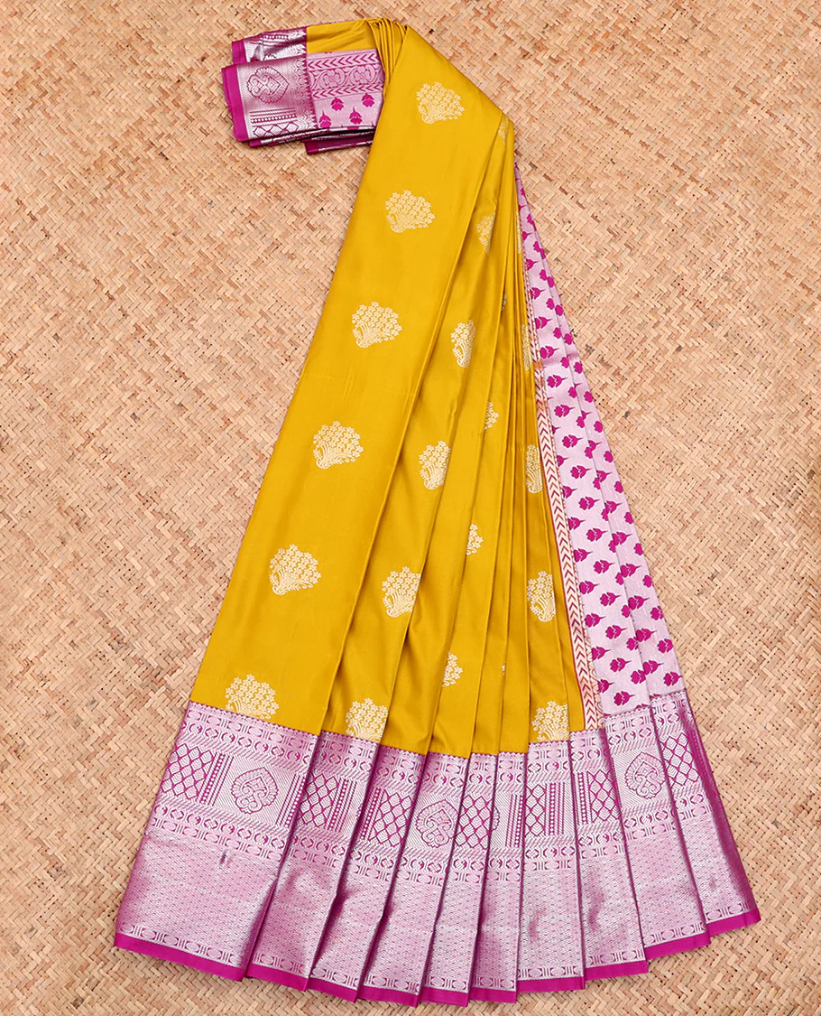 Mustard Budget Silk Saree, Graced with Buttas All Over Its Body, Complemented by a Contrast Traditional Zari Design Rettai Pettu Border, Pallu Steeped with Floral Designs, and Paired with a Contrast Blouse - Image 2
