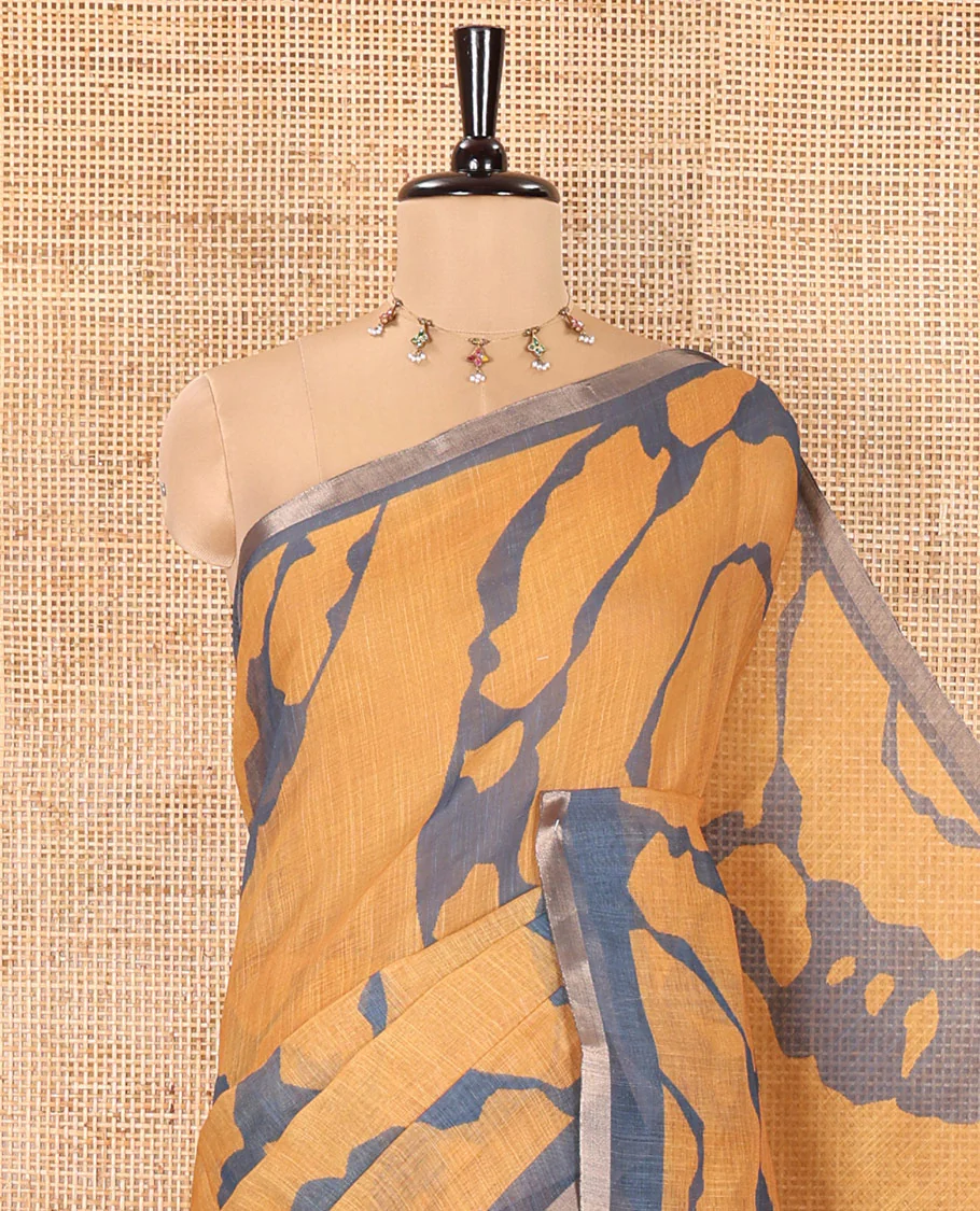 Mustard Linen Cotton Saree, Adorned with Shibori Prints on Its Body, Subtle Contrast Piping Border, Pallu of Floral Print, and Paired with a Matching Blouse - Image 2