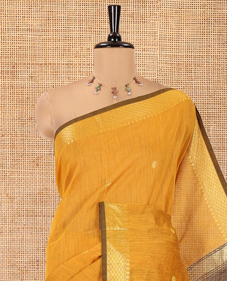 Mustard Maheshwari Cotton Saree, Flower Buttas All Over Its Body, Highlighted by Zari Border, Pallu of Contrast Floral Buttas, and a Contrast Blouse - Image 2