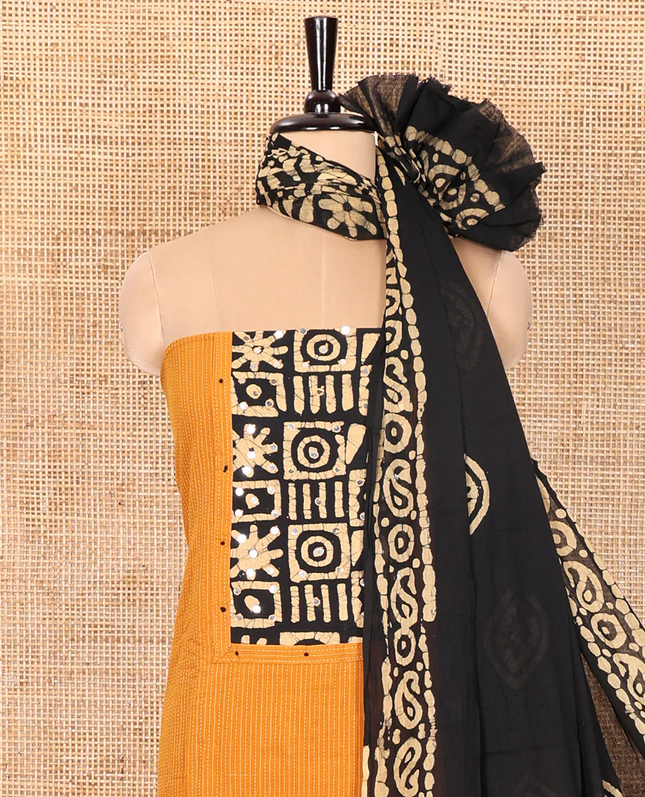 Mustard Material Chudidar Set Beautified with Kantha Embroidery, Batik Print, and Mirror Work on the Cotton Top, Comes with a Batik Geometric Patterns Printed Bottom, and a Cotton Batik Geometric Printed Dupatta - Image 3